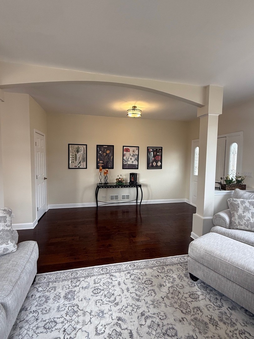 1785 Briggs Street Sycamore, IL 60178 - Photo 5 of 43 a living room with furniture and a rug
