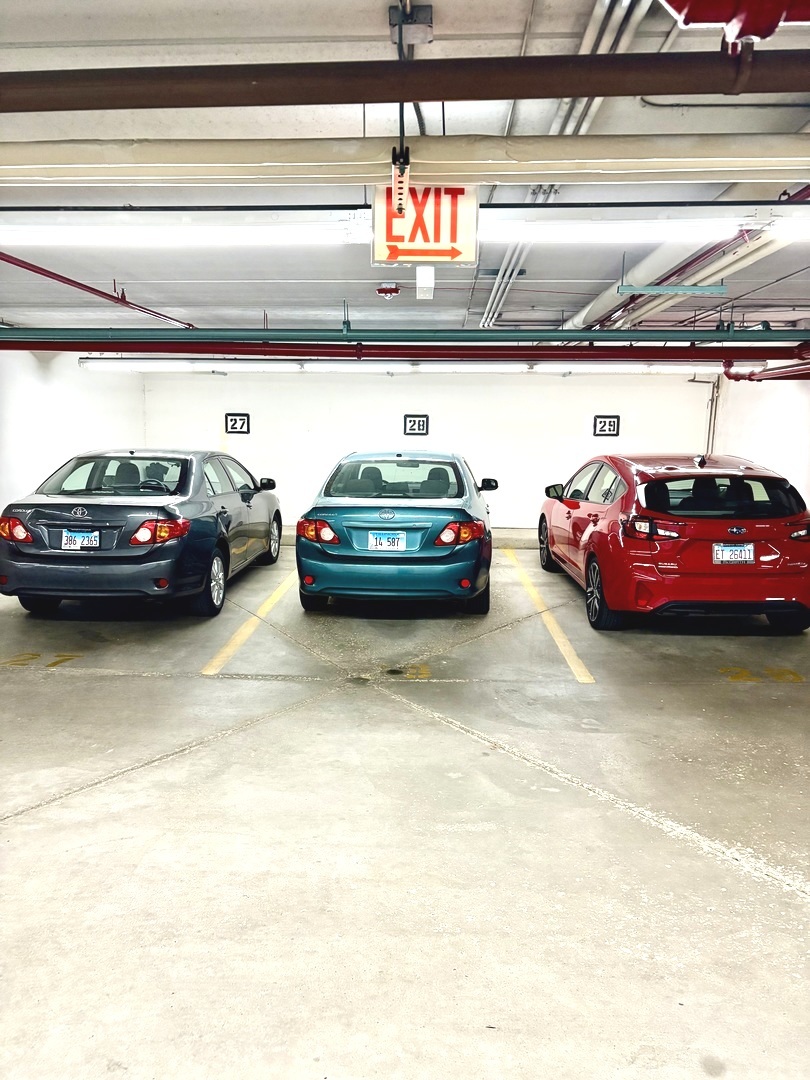 1220 Depot Street, Unit 305 Glenview, IL 60025 - Photo 27 of 28 a car parked in a parking area
