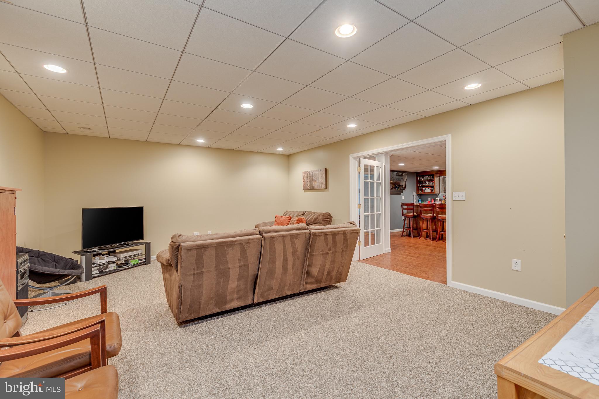 2 Dellaira Court Wrightstown, NJ 08562 - Photo 56 of 93 a living room with furniture and a flat screen tv