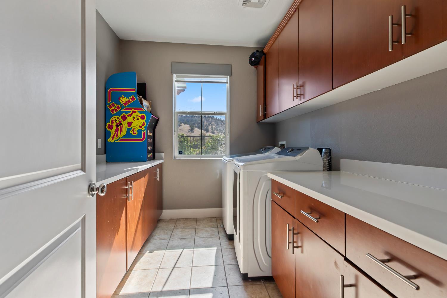 9423 Vintner Circle Patterson, CA 95363 - Photo 11 of 33 a kitchen with stainless steel appliances cabinets and a window