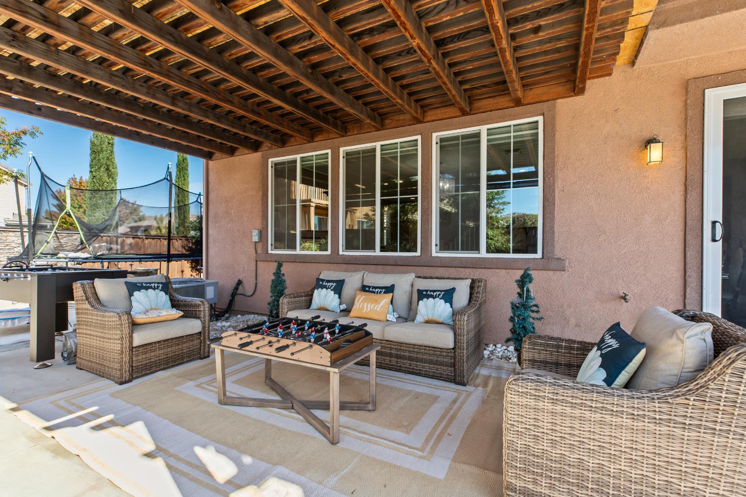 9423 Vintner Circle Patterson, CA 95363 - Photo 24 of 33 a outdoor living space with furniture and a rug