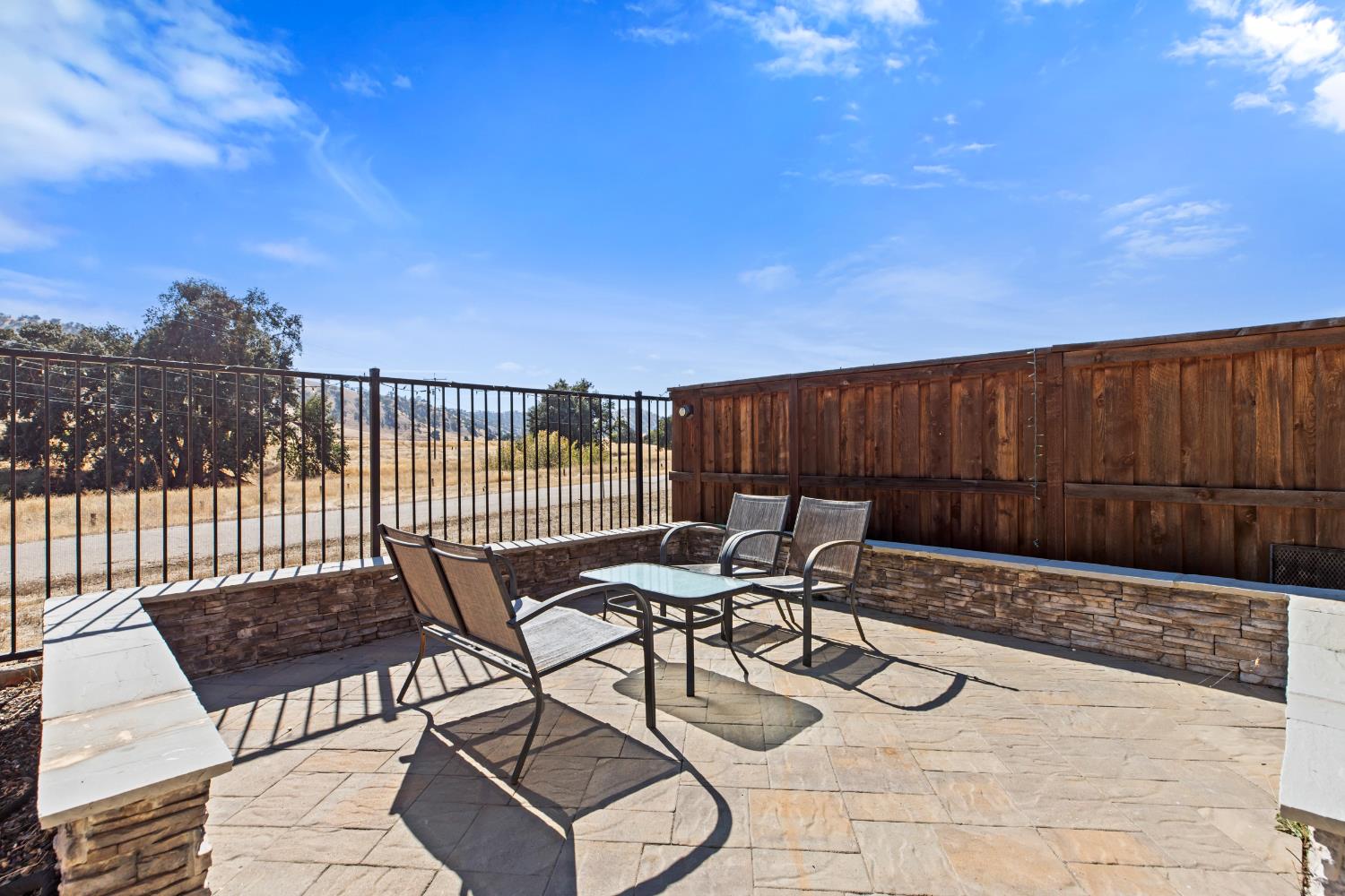 9423 Vintner Circle Patterson, CA 95363 - Photo 25 of 33 a view of a chairs and table in the patio