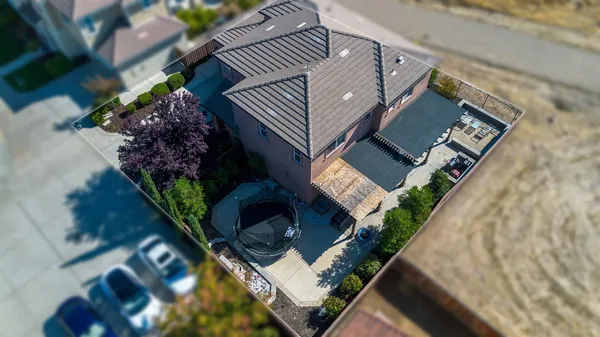 view of a house with a yard