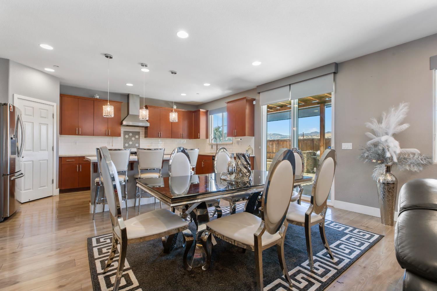 9423 Vintner Circle Patterson, CA 95363 - Photo 8 of 33 a view of a dining room with furniture