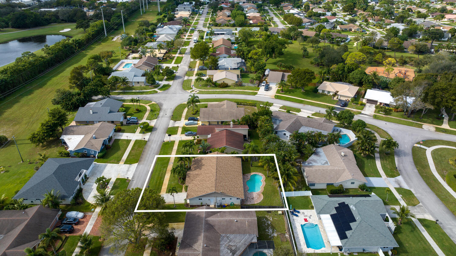 4695 Brandywine Drive Boca Raton, FL 33487 - Photo 24 of 28 an aerial view of residential houses with outdoor space