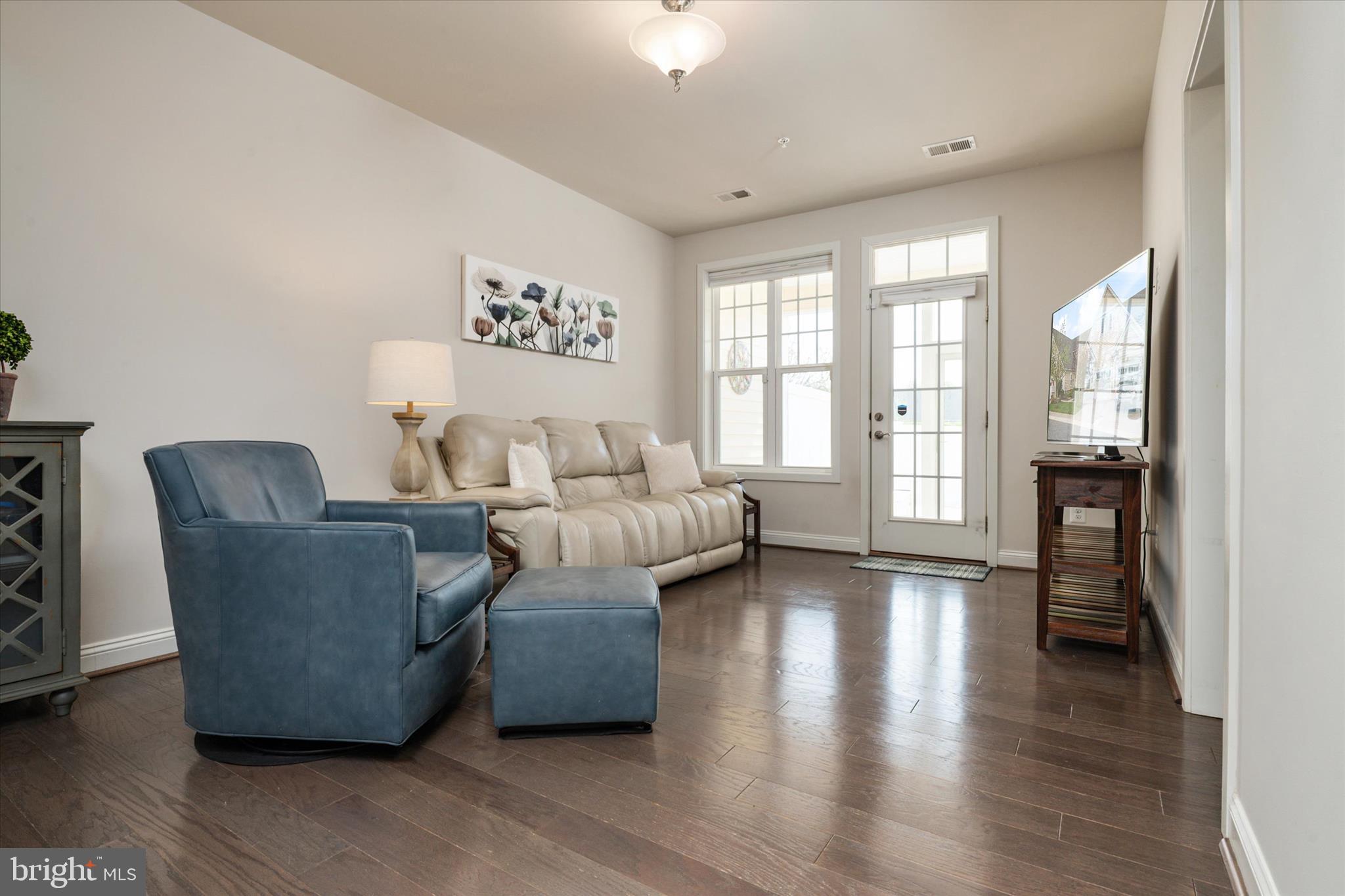 3108 Woodchuck Way Odenton, MD 21113 - Photo 12 of 51 Living Area with Door to Screen Porch