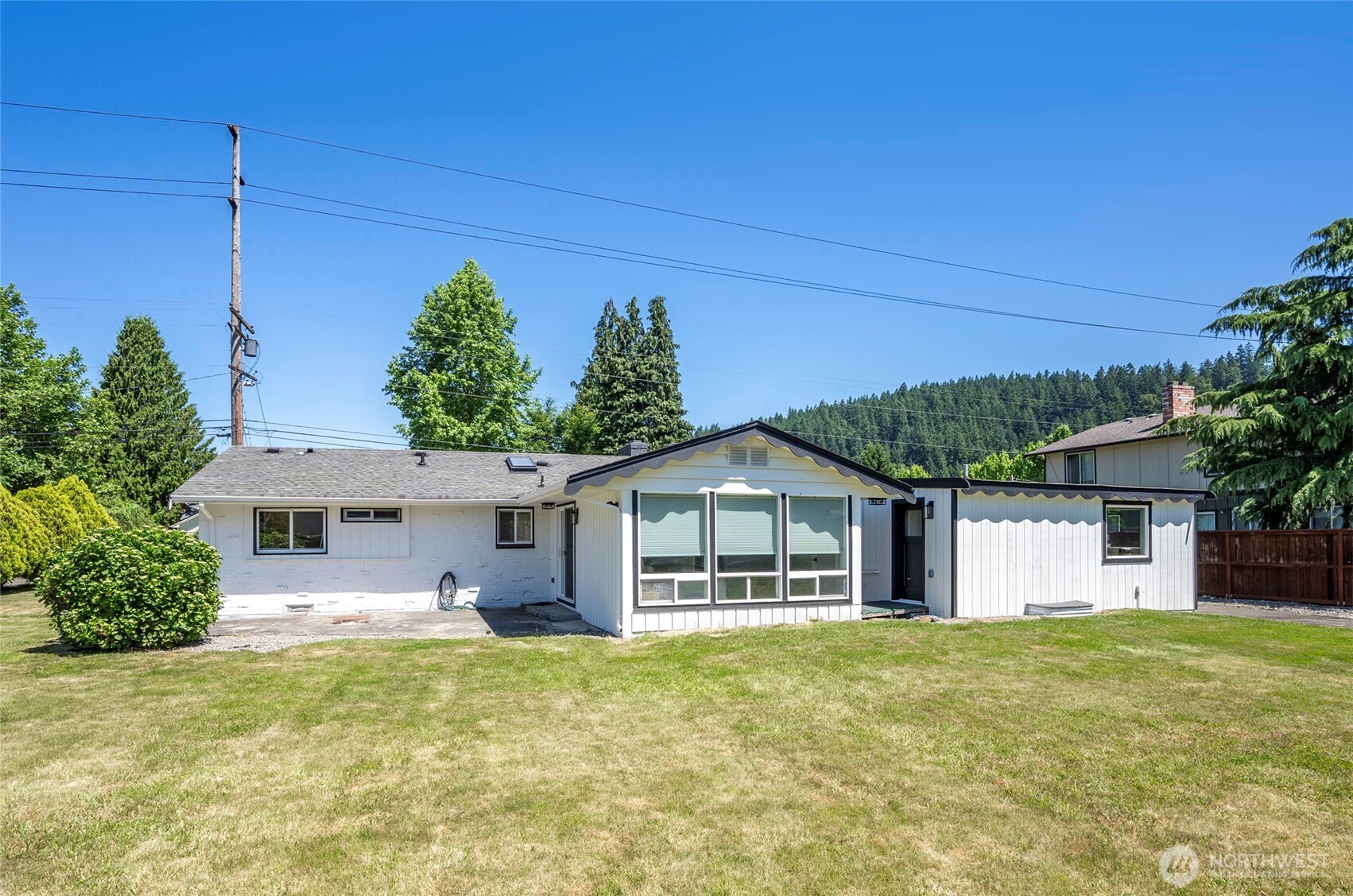 15512 Elm Street East Sumner, WA 98390 - Photo 23 of 37 front view of a house with a big yard