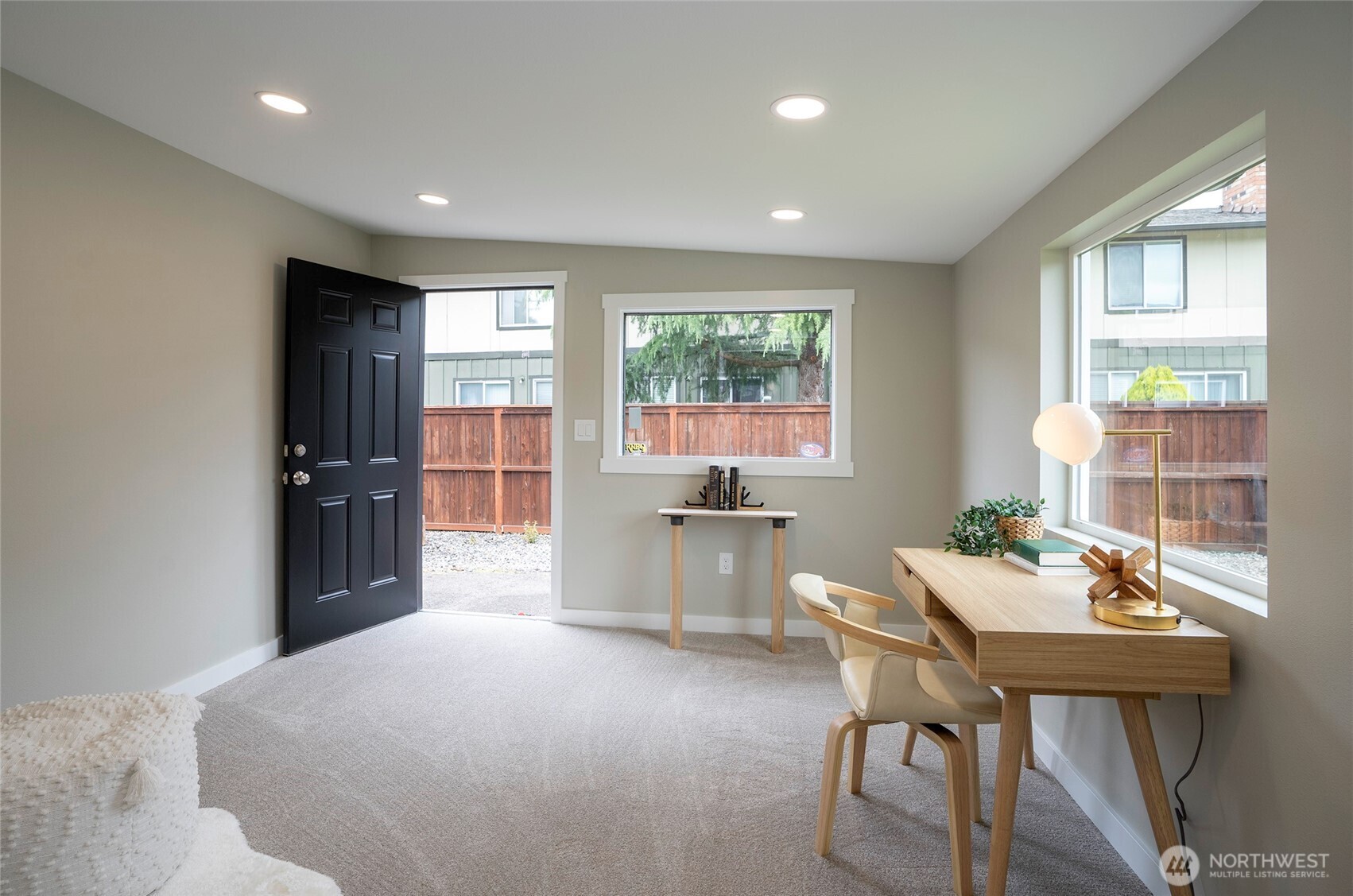 15512 Elm Street East Sumner, WA 98390 - Photo 27 of 37 a living room with furniture and windows