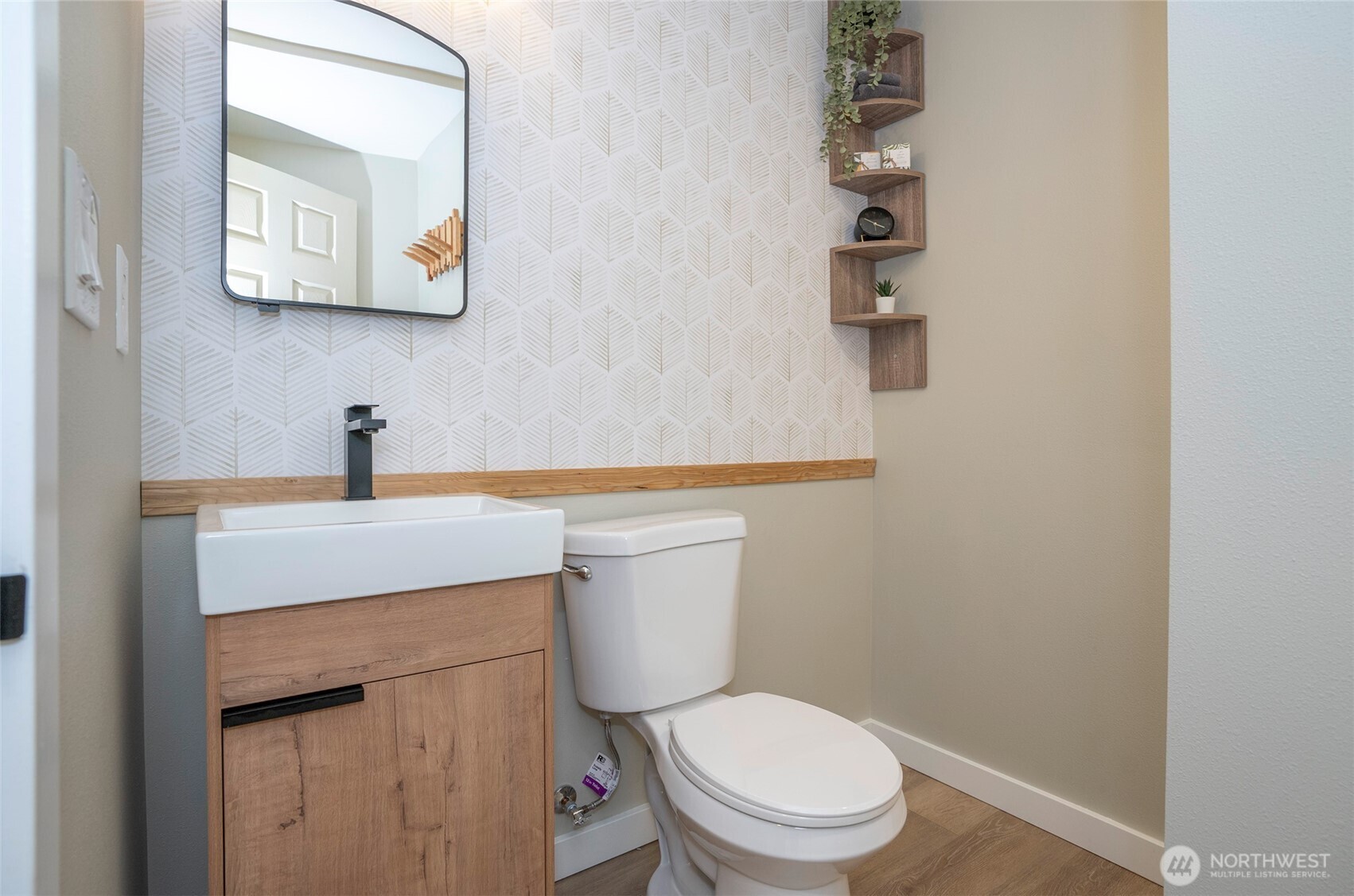 15512 Elm Street East Sumner, WA 98390 - Photo 30 of 37 a bathroom with a toilet a sink and mirror