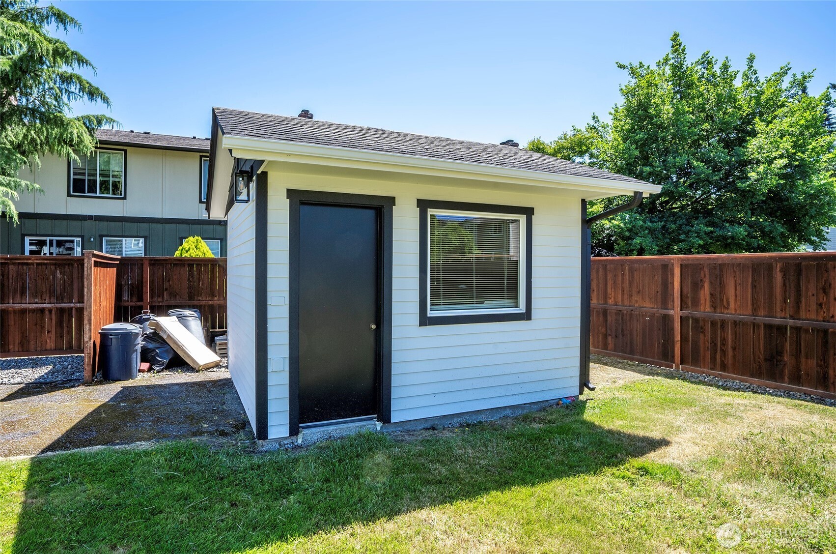 15512 Elm Street East Sumner, WA 98390 - Photo 32 of 37 a view of house with backyard