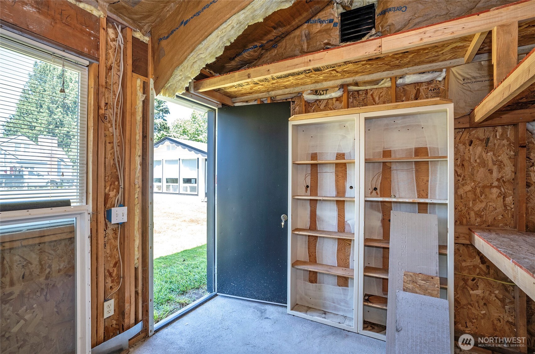 15512 Elm Street East Sumner, WA 98390 - Photo 33 of 37 a view of a door and a window