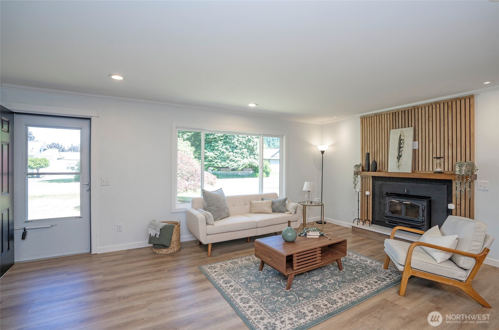15512 Elm Street East Sumner, WA 98390 - Photo 4 of 37 a living room with furniture and a fireplace