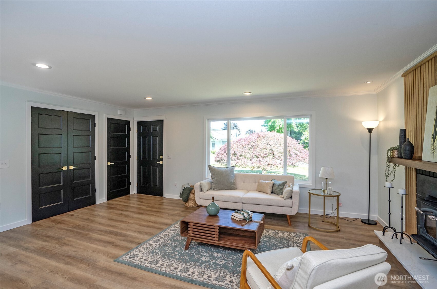15512 Elm Street East Sumner, WA 98390 - Photo 6 of 37 a living room with furniture a window and a flat screen tv