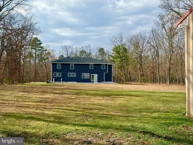 a view of a house with a swimming pool