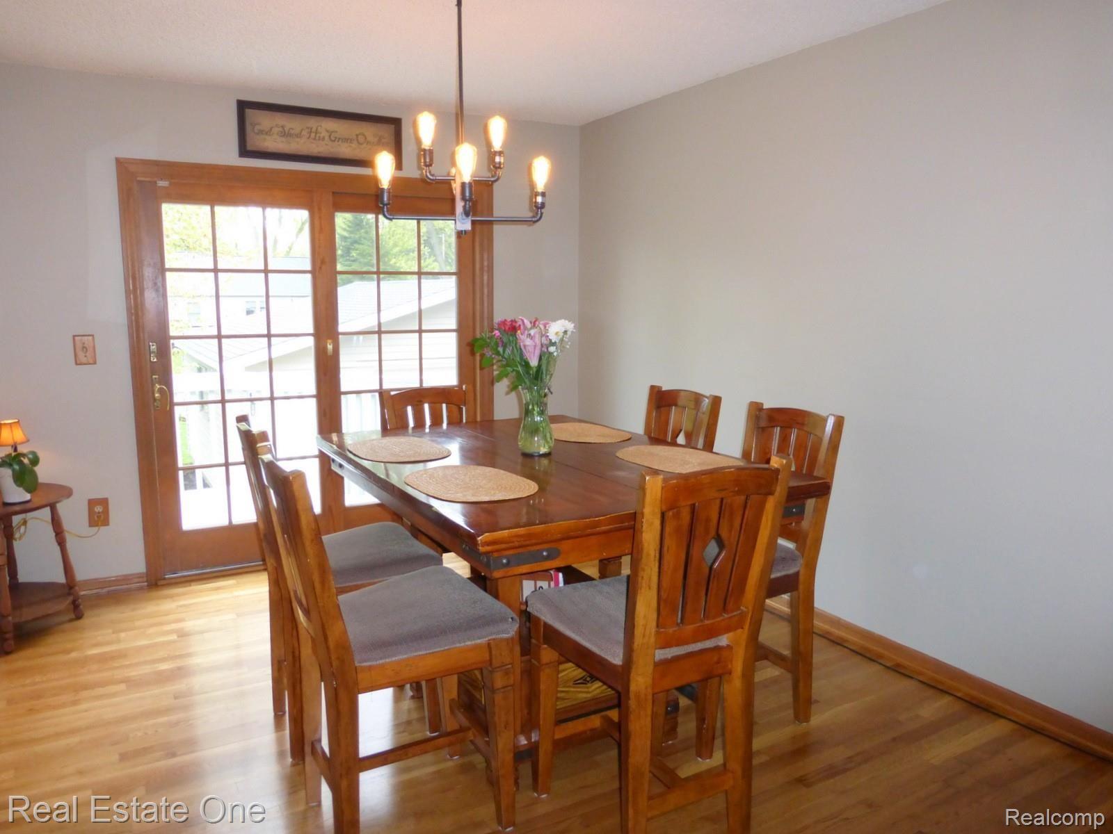 645 Hidden Ridge Drive Troy, MI 48083 - Photo 3 of 43 Dining Room leads to the deck!