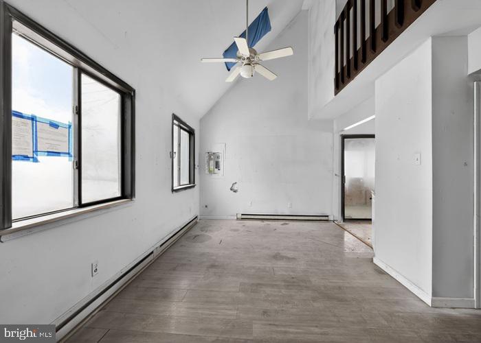1538 Deer Run East Bushkill, PA 18324 - Photo 7 of 18 a view of a livingroom with a ceiling fan and window