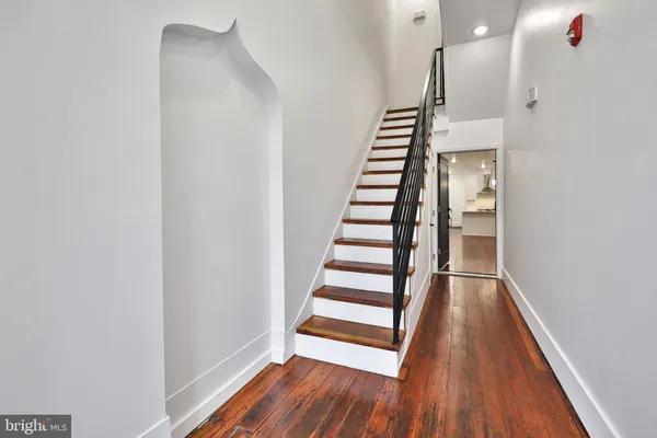 a view of entryway with wooden floor