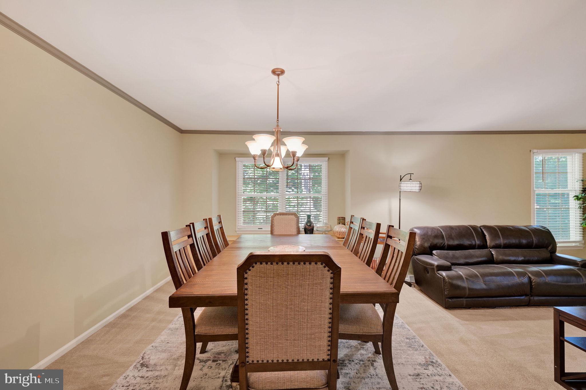 176 Burning Tree Road Dover, DE 19904 - Photo 8 of 33 Elegant dining space with natural light.