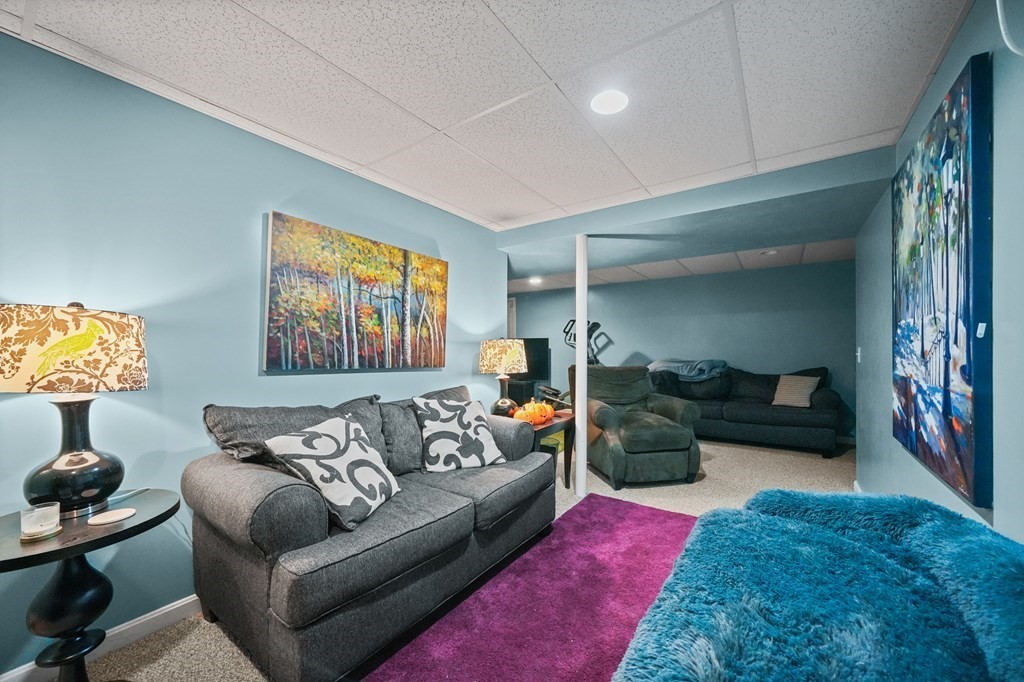 3 Carter Way Worcester, MA 01609 - Photo 22 of 32 a living room with furniture and a couch