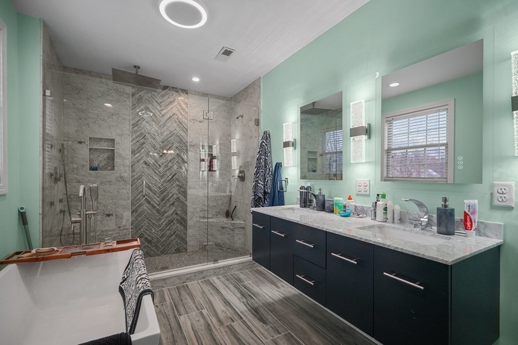 3 Carter Way Worcester, MA 01609 - Photo 4 of 32 a bathroom with a double vanity sink mirror double and shower