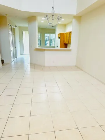 a kitchen with a stove a sink and a refrigerator