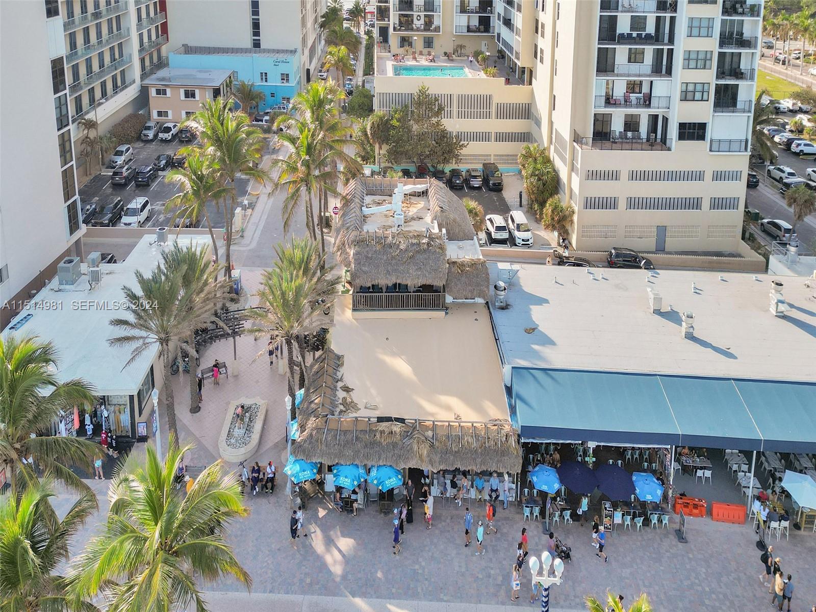 900 North Surf Road, Unit 2 Hollywood, FL 33019 - Photo 46 of 48 a aerial view of a chairs and table in the patio