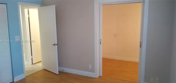 a bathroom with a toilet and a bathtub