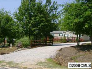 5134 Cross Roads Church Road Ruby, SC 29741 - Photo 3 of 4 a view of a house with a yard