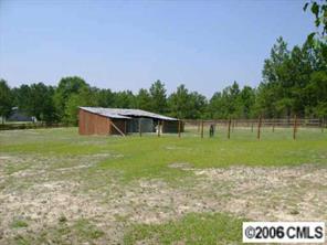5134 Cross Roads Church Road Ruby, SC 29741 - Photo 4 of 4 a front view of a house with a yard