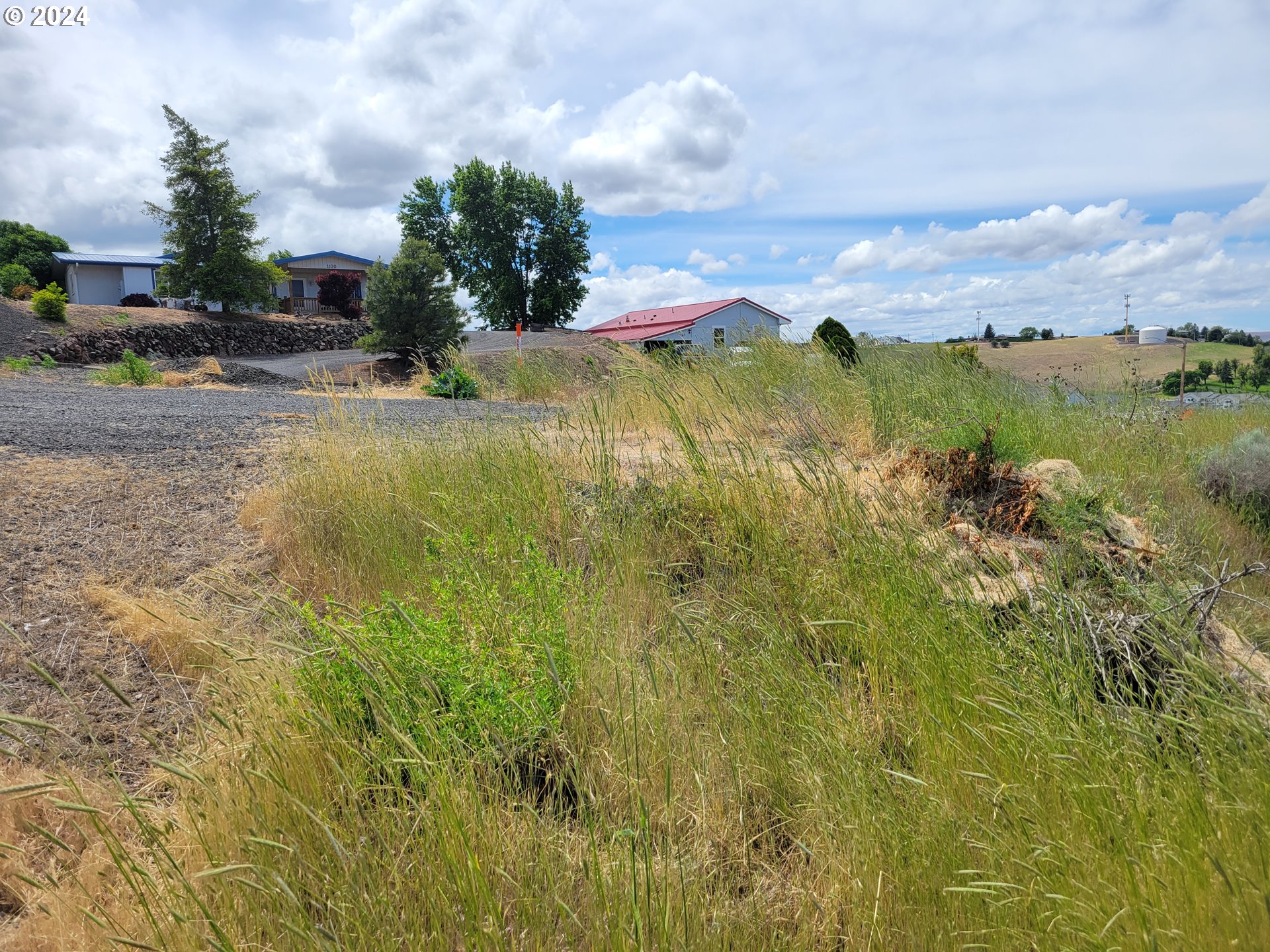 1101 Marshall Place Pendleton, OR 97801 - Photo 15 of 26 a view of a lake with a big yard