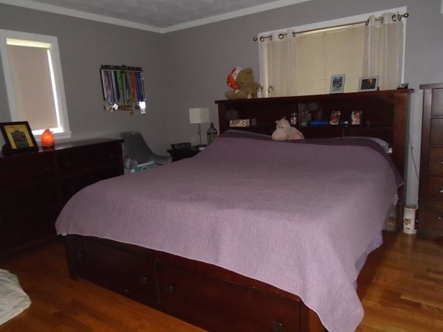 859 North 21st Road Tonica, IL 61370 - Photo 11 of 31 a bedroom with a bed and a night stand