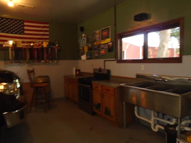 859 North 21st Road Tonica, IL 61370 - Photo 24 of 31 a kitchen with a sink and a stove top oven