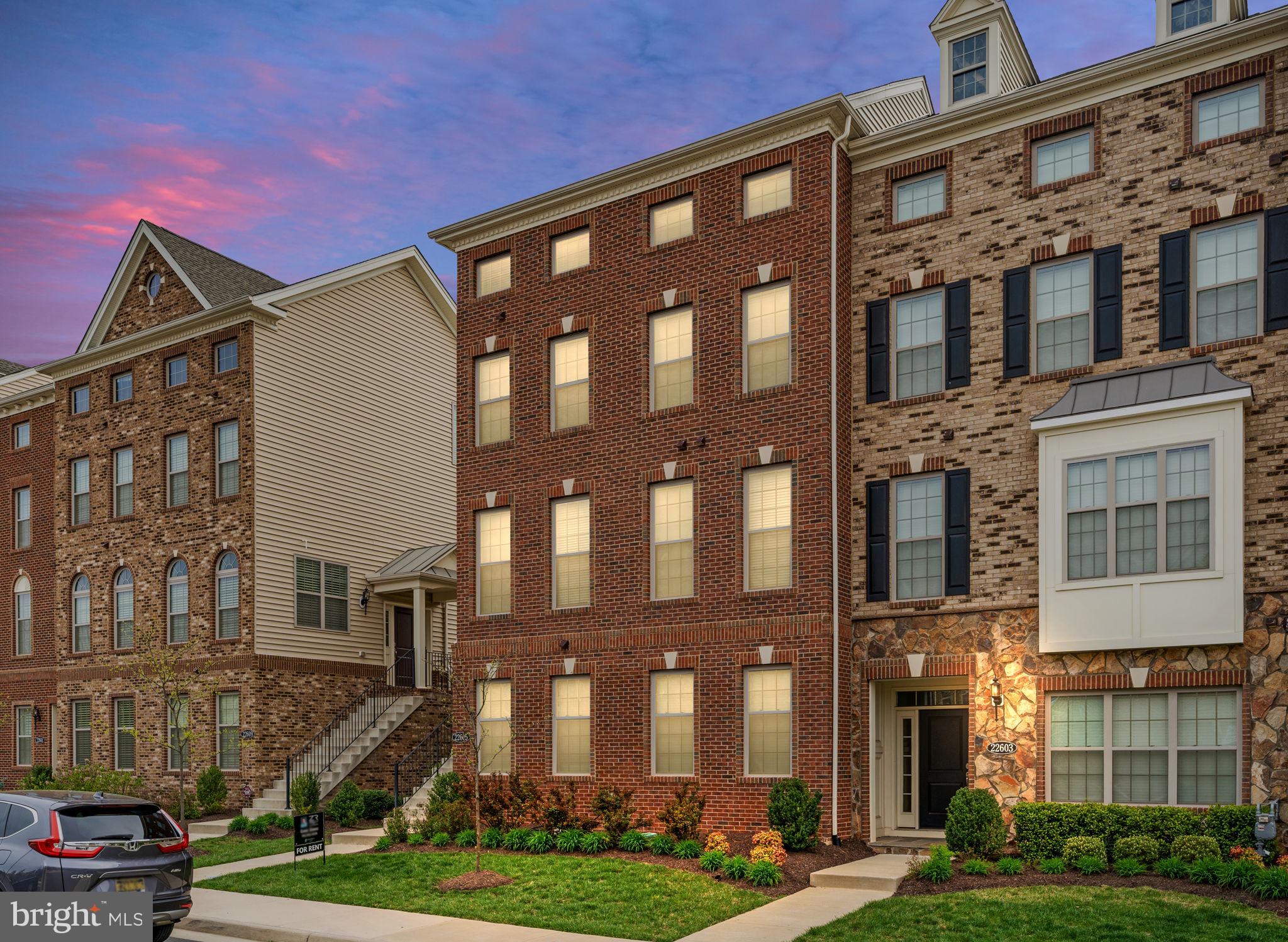 22605 Naugatuck Square Ashburn, VA 20148 - Photo 1 of 32 a front view of a building