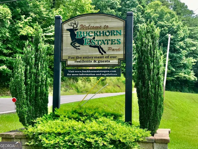 a sign on the side of the road