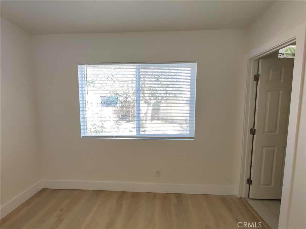 13154 Cedar Street Westminster, CA 92683 - Photo 4 of 7 an empty room with a window