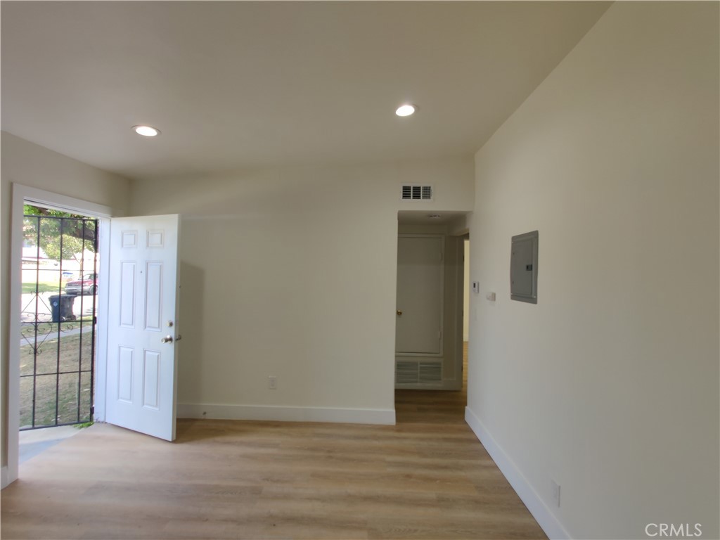 13154 Cedar Street Westminster, CA 92683 - Photo 5 of 7 a view of hallway with wooden floor