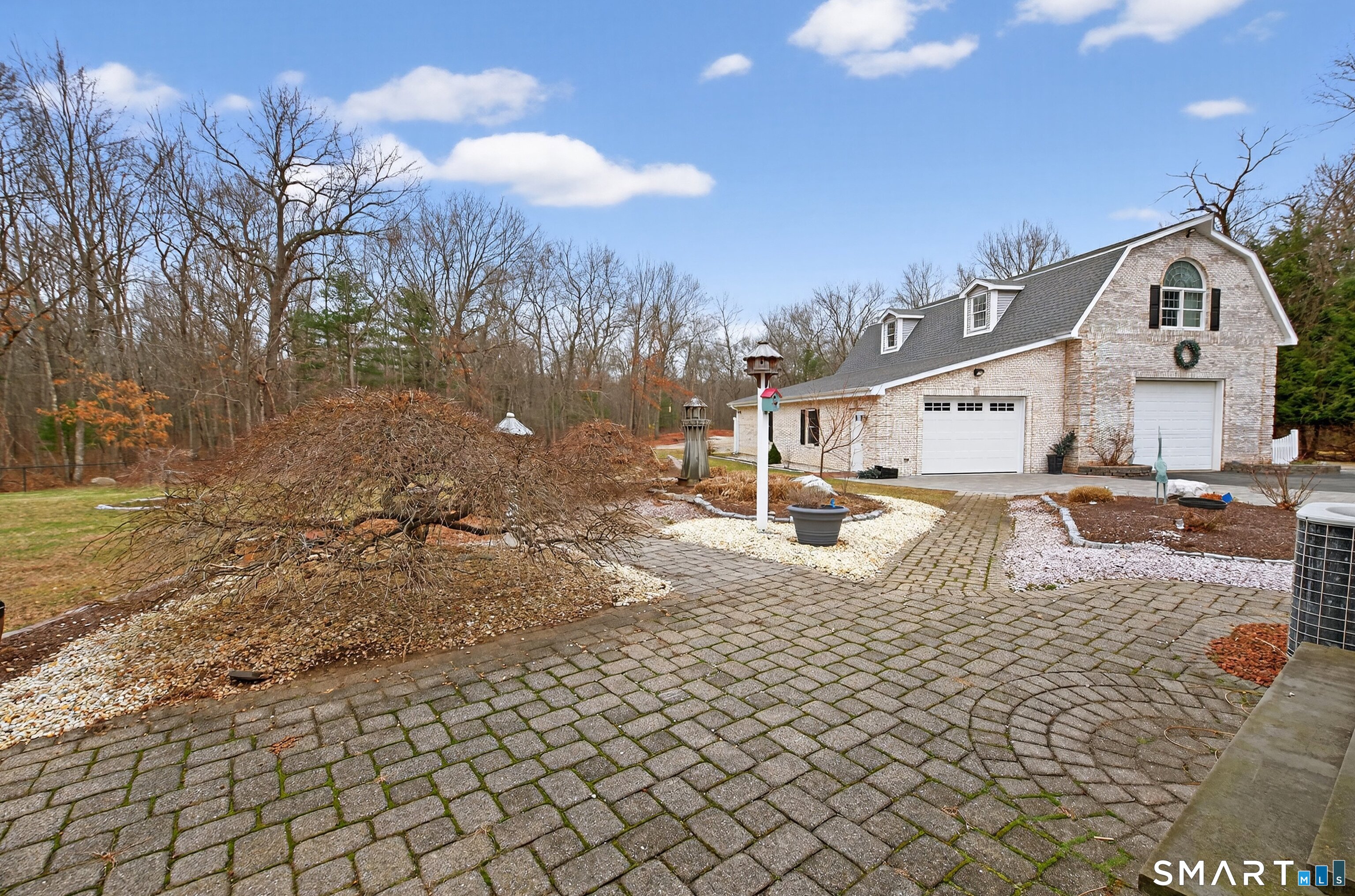 724 Strong Road South Windsor, CT 06074 - Photo 31 of 39 a view of a white house with a yard