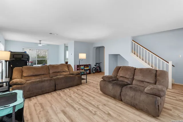 a living room with furniture and a couch