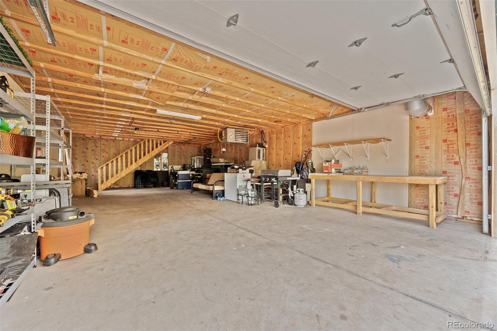 15535 South Elk Creek Road Pine, CO 80470 - Photo 24 of 25 a view of a room with gym equipment