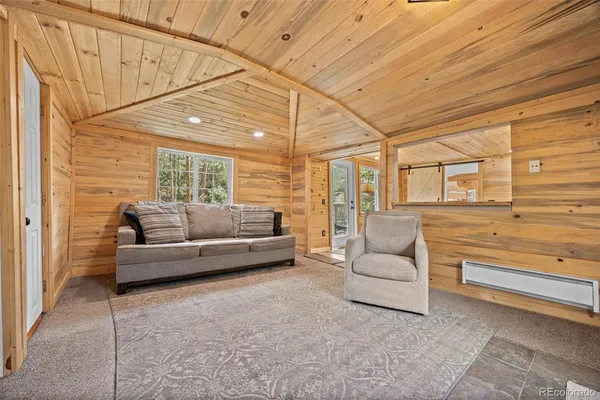 a view of a livingroom with furniture
