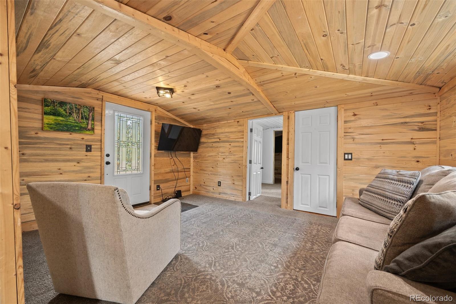 15535 South Elk Creek Road Pine, CO 80470 - Photo 8 of 25 a view of a livingroom with furniture