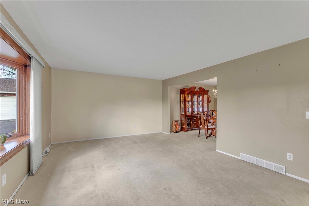 563 North Carpenter Road Brunswick, OH 44212 - Photo 7 of 45 Living room with light colored carpet