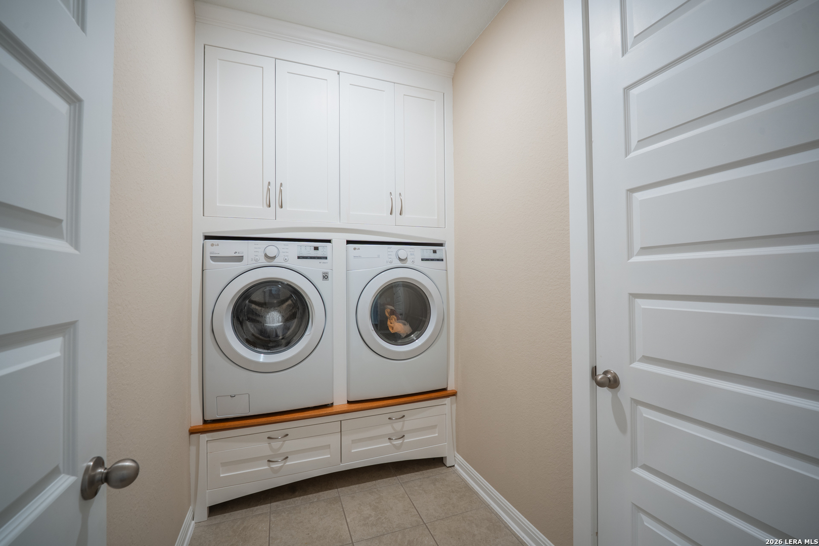 4947 Ranahan Pass St. Hedwig, TX 78152 - Photo 29 of 37 a utility room with dryer and washer