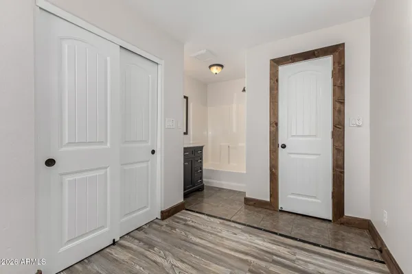 a view of a livingroom from a hallway