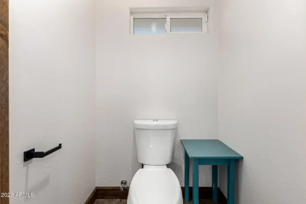 a bathroom with a toilet