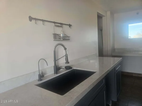 a close view of a sink and tap