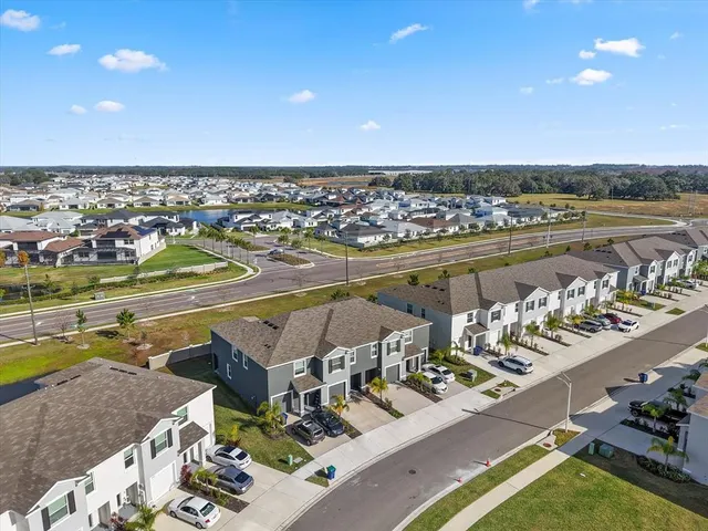 a view of a swimming pool with a lot of trees around