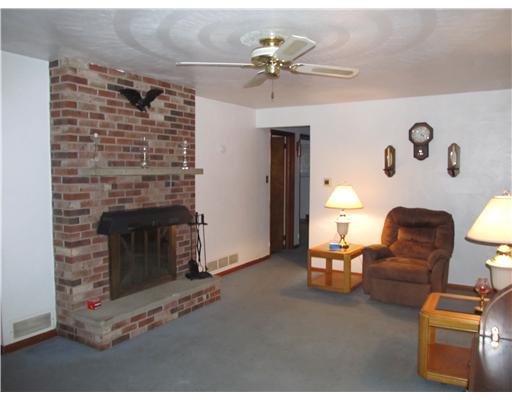 1620 Sandy Hill Road North Huntingdon, PA 15642 - Photo 2 of 7 Living Room. Woodburning FP, plaster walls, HW under carpet.