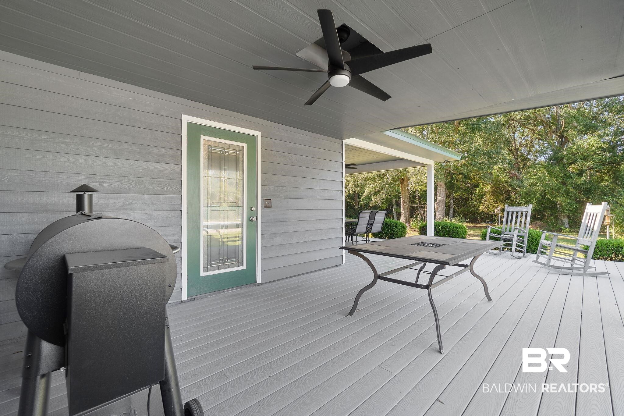 27300 C R Watson Road Robertsdale, AL 36567 - Photo 22 of 35 Wooden deck with ceiling fan