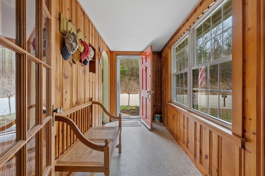 613 Petersham Road Athol, MA 01331 - Photo 15 of 41 a view of an entryway with wooden floor and windows